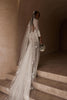 Long length of the Pierlot veil showing embroidery