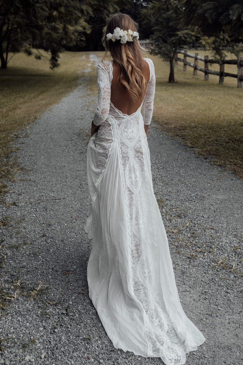 Premium Photo  Graceful back of the bride in incredible lace dress