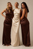 Three women modeling floor-length satin bridesmaid dresses in dark brown and ivory, standing against a warm beige studio background.