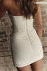 A woman wears a structured corset-style bodice and a short wedding skirt_XS_