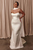 Woman wearing a white strapless gown with a white shawl