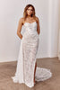 Woman wearing a strapless lace wedding dress with a split_XS_