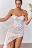 Woman wearing a strapless lace wedding dress_L_