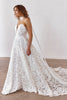 Woman wearing a strapless lace wedding dress and necktie_XS_