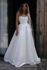Woman wearing a satin A-line wedding dress_XS_