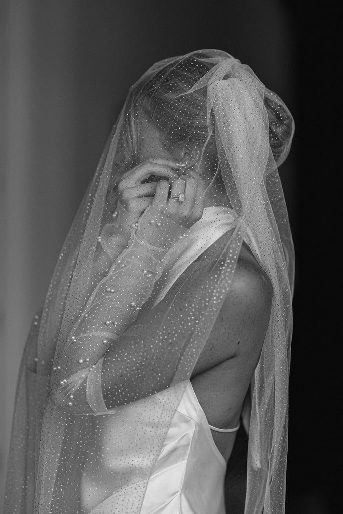 Bride wearing the Shimmy Veil over head and shoulders