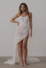 Woman wearing a strapless lace wedding dress.