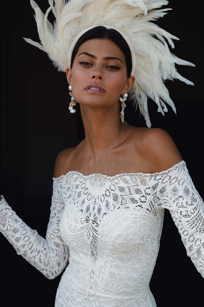 Nathalia gown with feathered headpiece